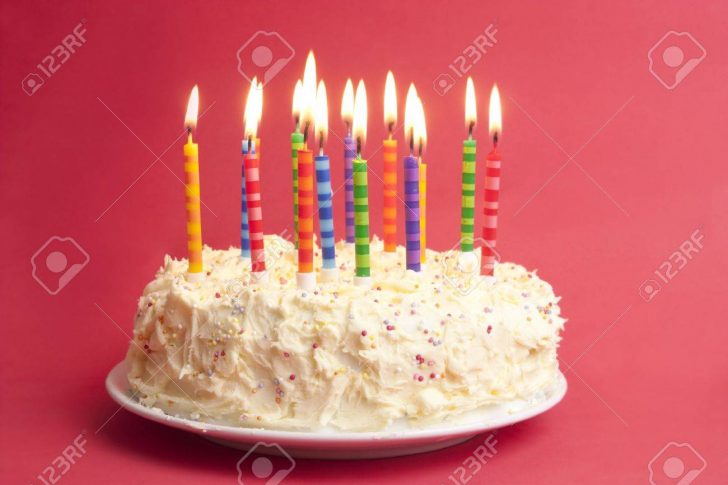 Birthday Cake With Lots Of Candles Birthday Cake With Lots Of Candles On A Red Background Stock Photo Birthday Cake With Lots Of Candles Birthday Cake With Lots Of Candles On A Red Background Stock Photo