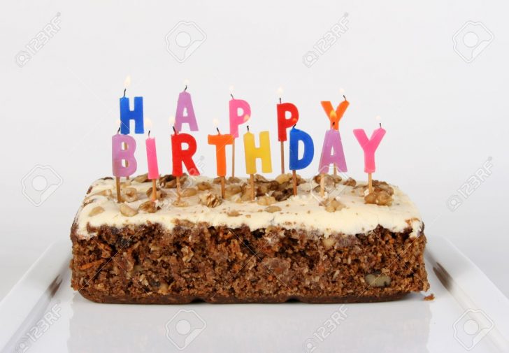 Carrot Cake Birthday Cake Birthday Cake Candles Lit On A Carrot Cake Stock Photo Picture And Carrot Cake Birthday Cake Birthday Cake Candles Lit On A Carrot Cake Stock Photo Picture And